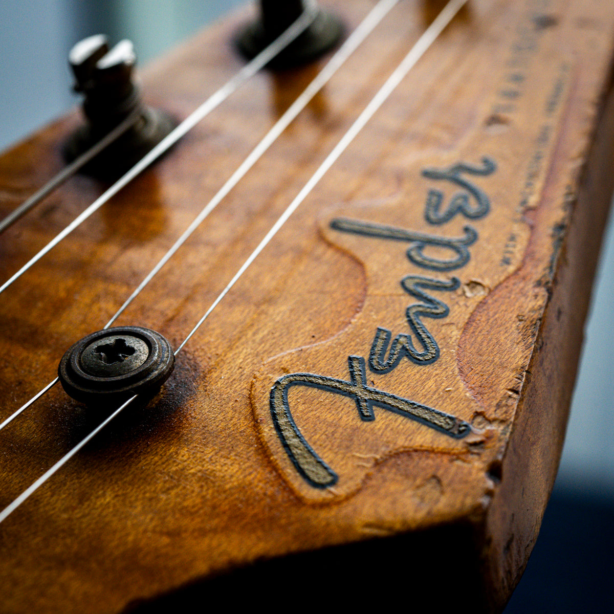 Close-up of a vintage Fender decal on a stratocaster headstock