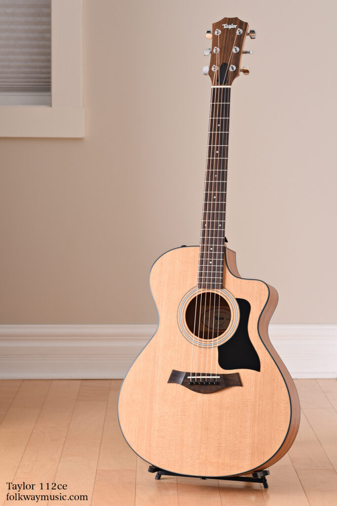 New Taylor 112ce acoustic guitar